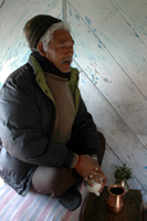 Recitation of oral texts by
Latte Apa, senior ritual practitioner of the
Thangmi community, Darjeeling, India. Photo by
Sara Shneiderman, December 2004. World Oral Literature Project